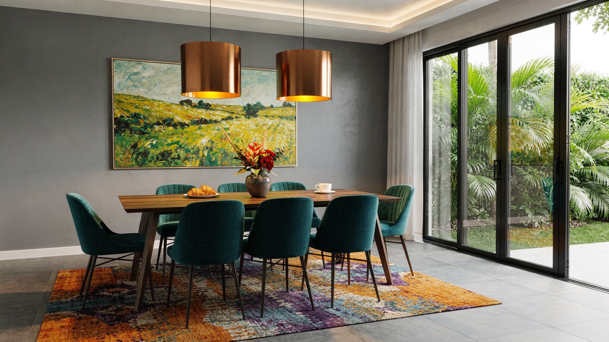 A jewel-tone dining room with teal velvet chairs, copper pendant lights and a colourful layered rug